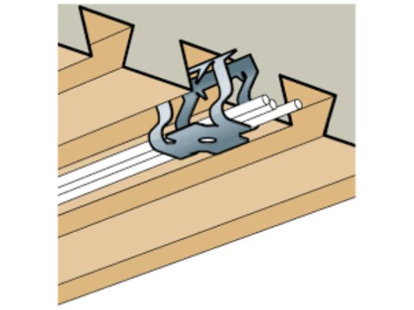 Walraven HOL2 BritClips dovetail decking clip fitted into a composite metal deck profile